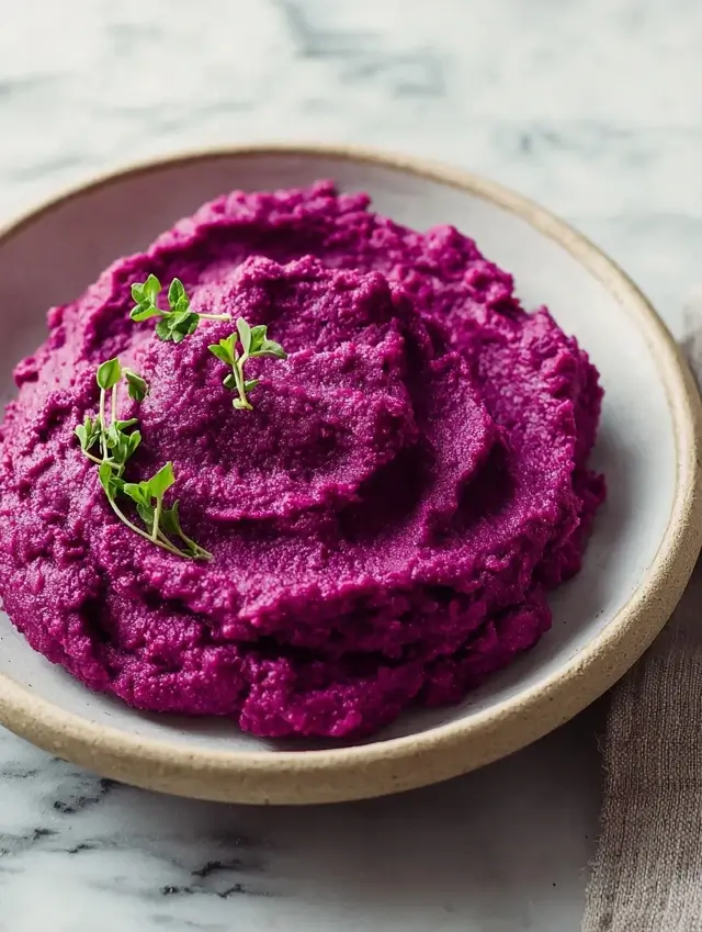Roasted purple sweet potato recipe with honey and sesame seeds.